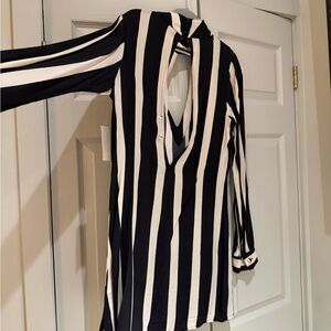 Brand New Sexy open back - deep V split in front dress.